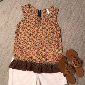 Cute sheer tank with ruffle bottom!